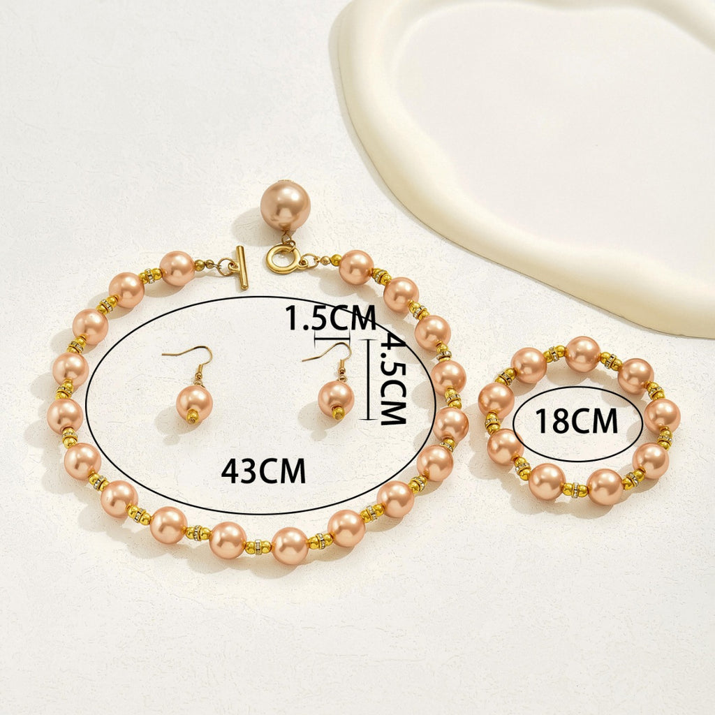 Warm Pearl-Effect Bow Jewelry — product image 4