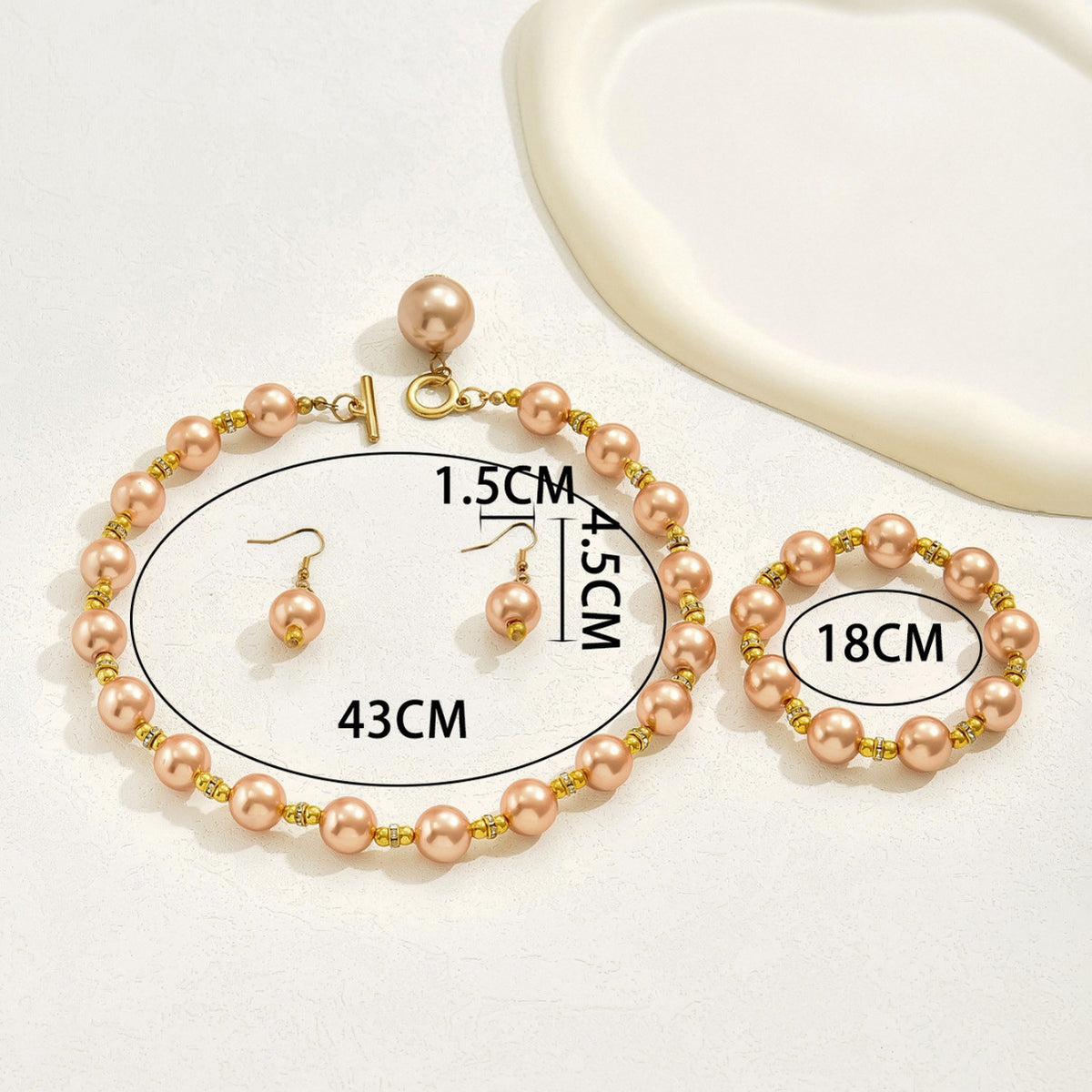 Warm Pearl-Effect Bow Jewelry — product image 4