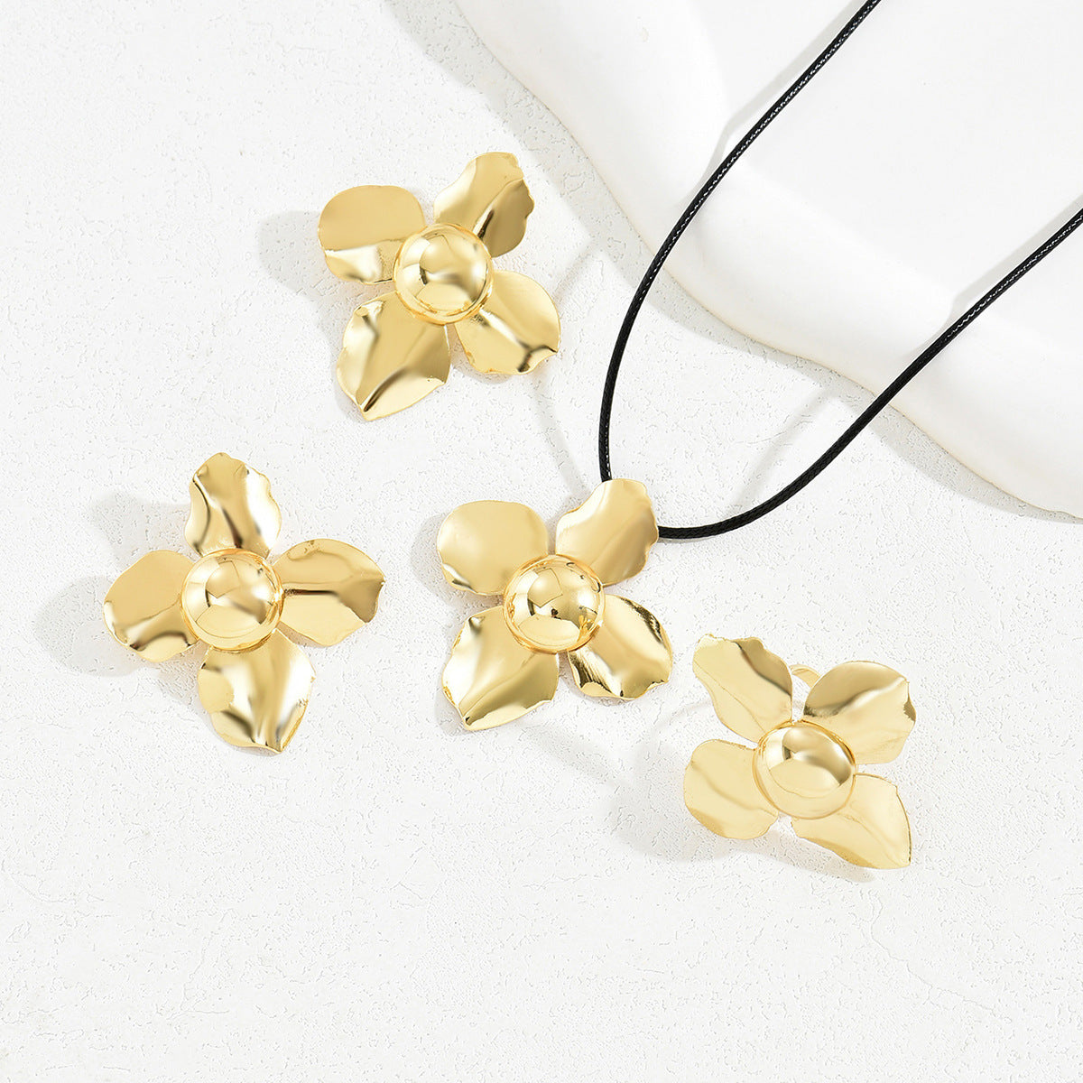 Rounded Cross-Petal Cord Jewelry — product image 3