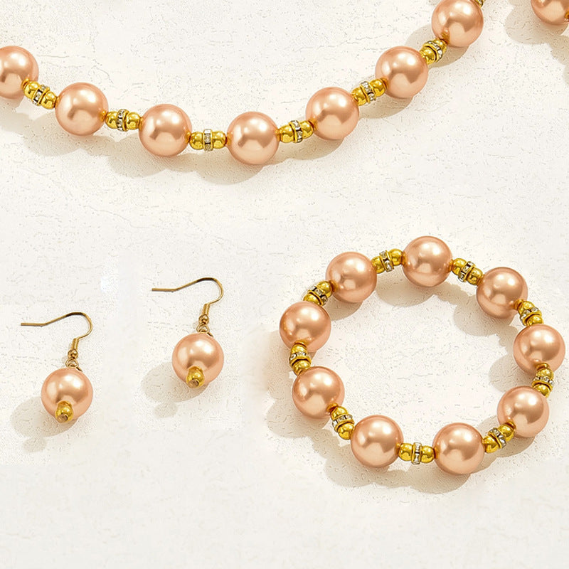 Warm Pearl-Effect Bow Jewelry — product image 3