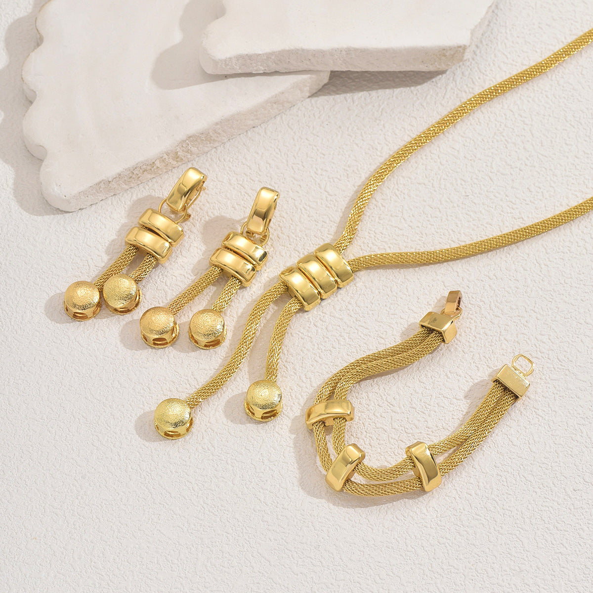 Knot and Tassel Jewelry — product image 3