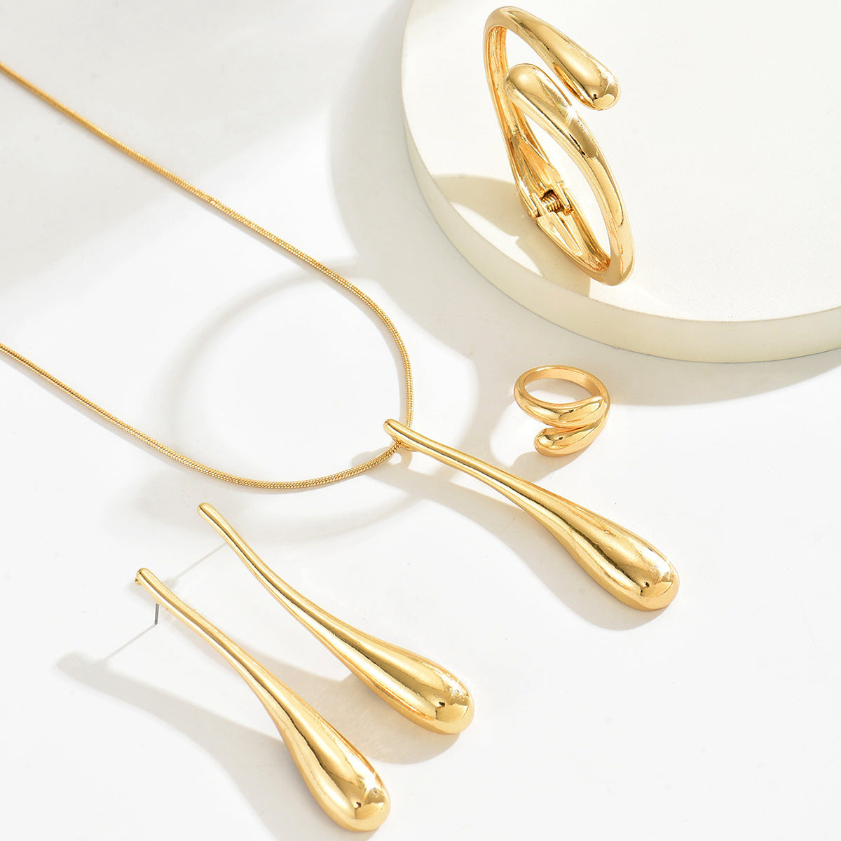 Elongated Liquid Drop Jewelry — product image 3